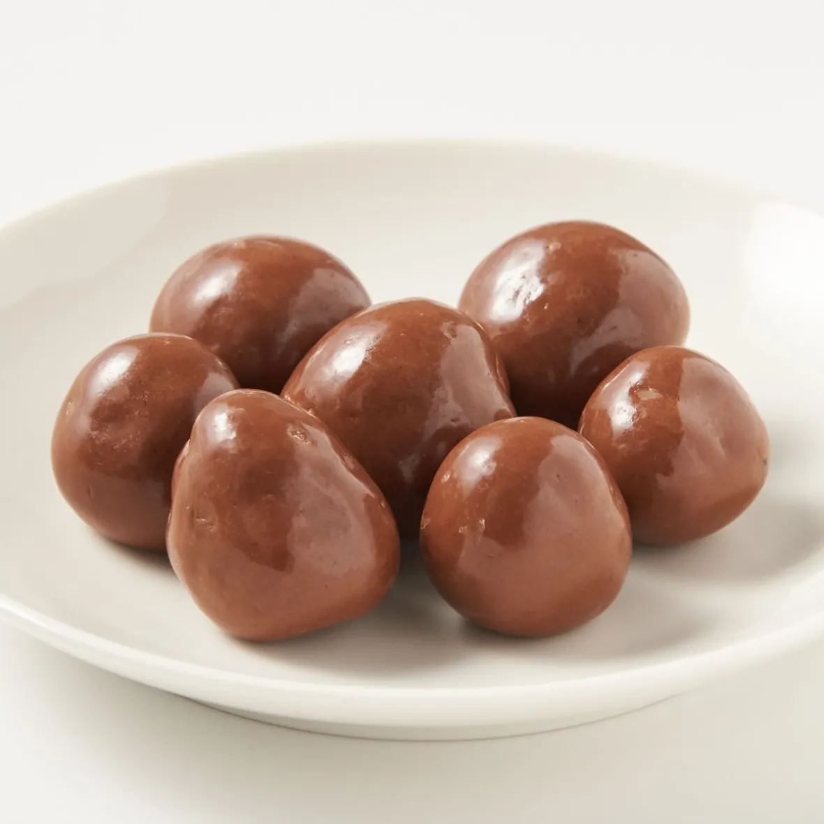 New Muji Frambuesas cubiertas de chocolate con leche