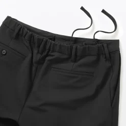 Outlet Muji Pantalones de pierna ajustada con forro polar cortaviento para hombre